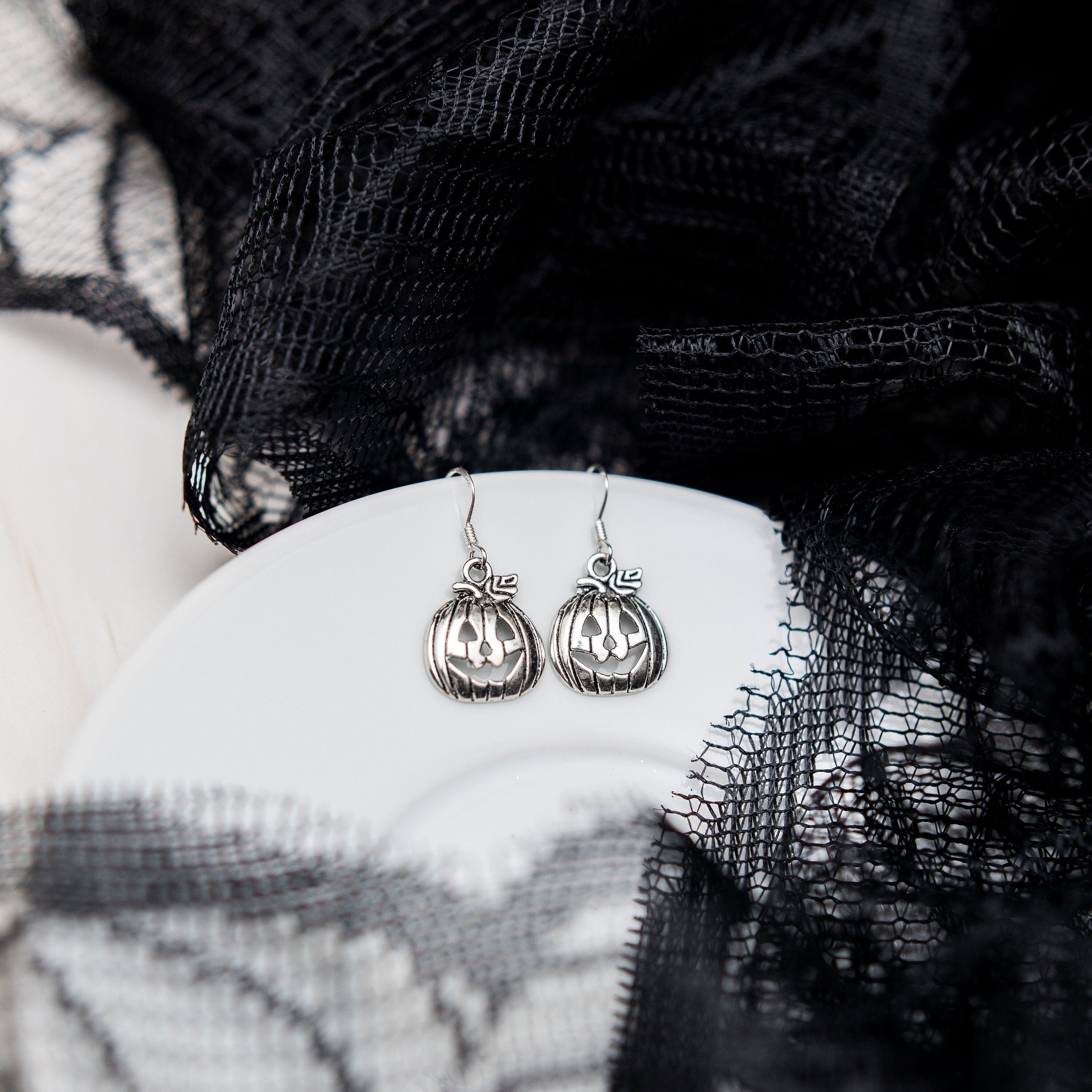 Pumpkin earrings, jack o' lantern charms, alternative, drop hooks, sterling silver ear wires, Halloween jewellery, October birthday, Autumn