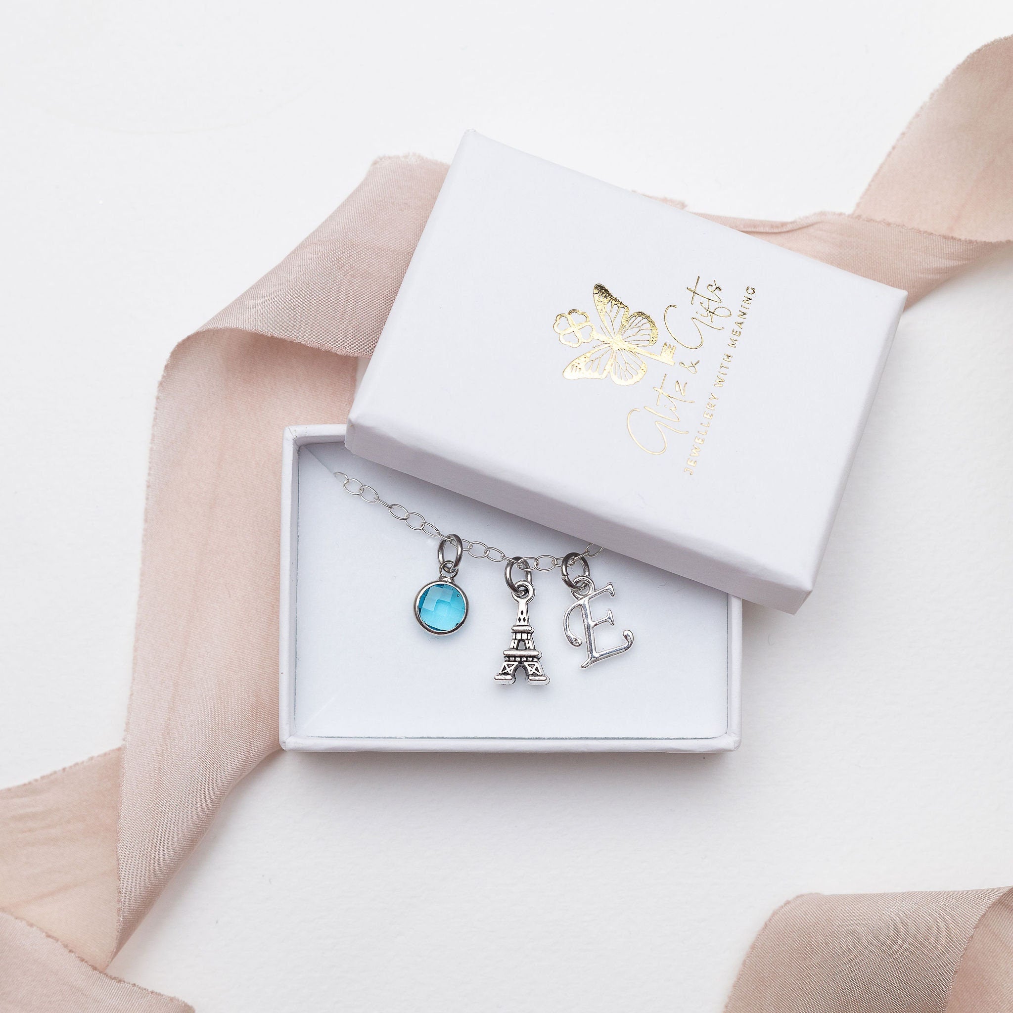 Paris bracelet, personalised gifts, Eiffel tower jewellery, birthstone initial charm, France surprise trip reveal, French theme accessory