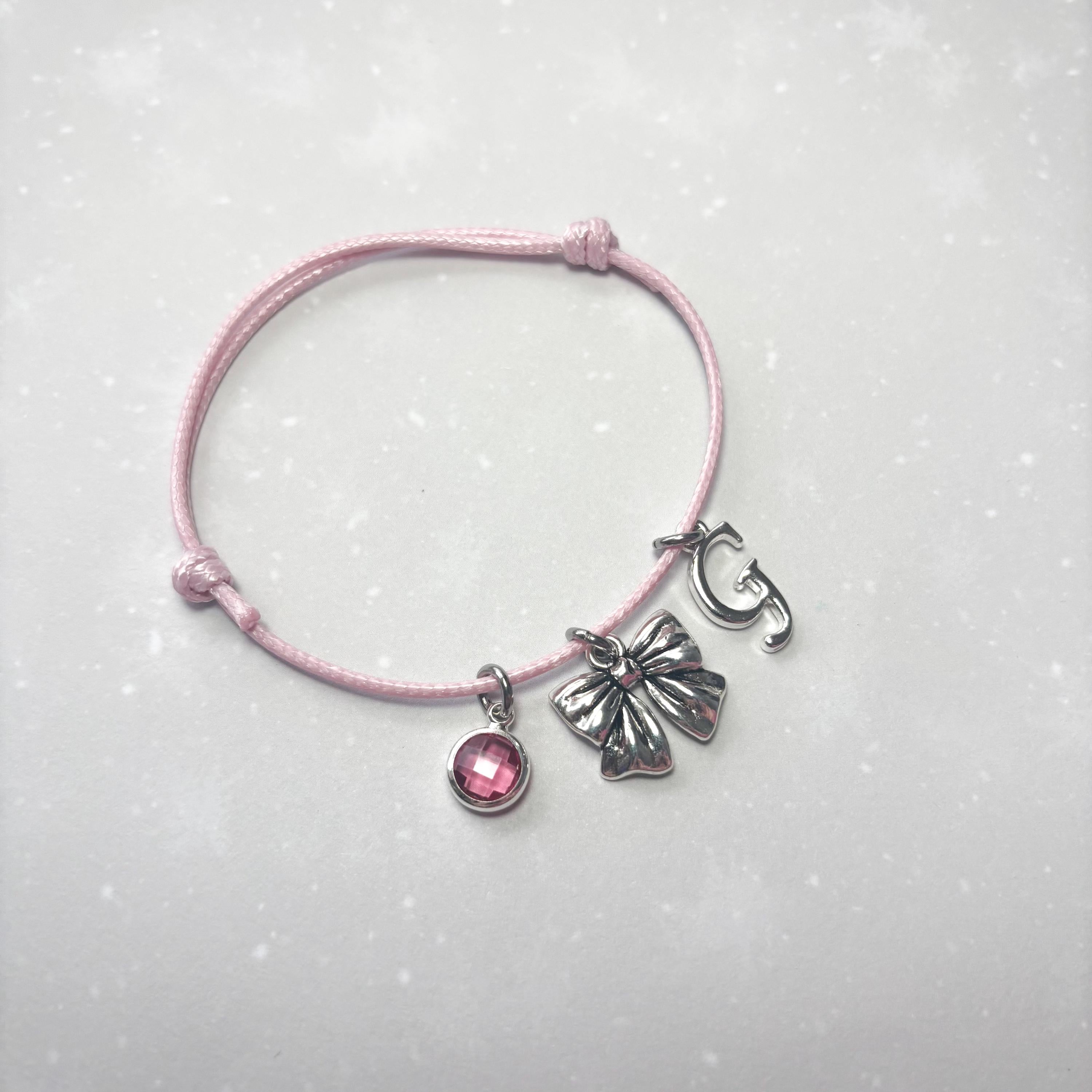 Personalised Bow Charm Bracelet: Initial & Birthstone, Waxed Cord Jewellery
