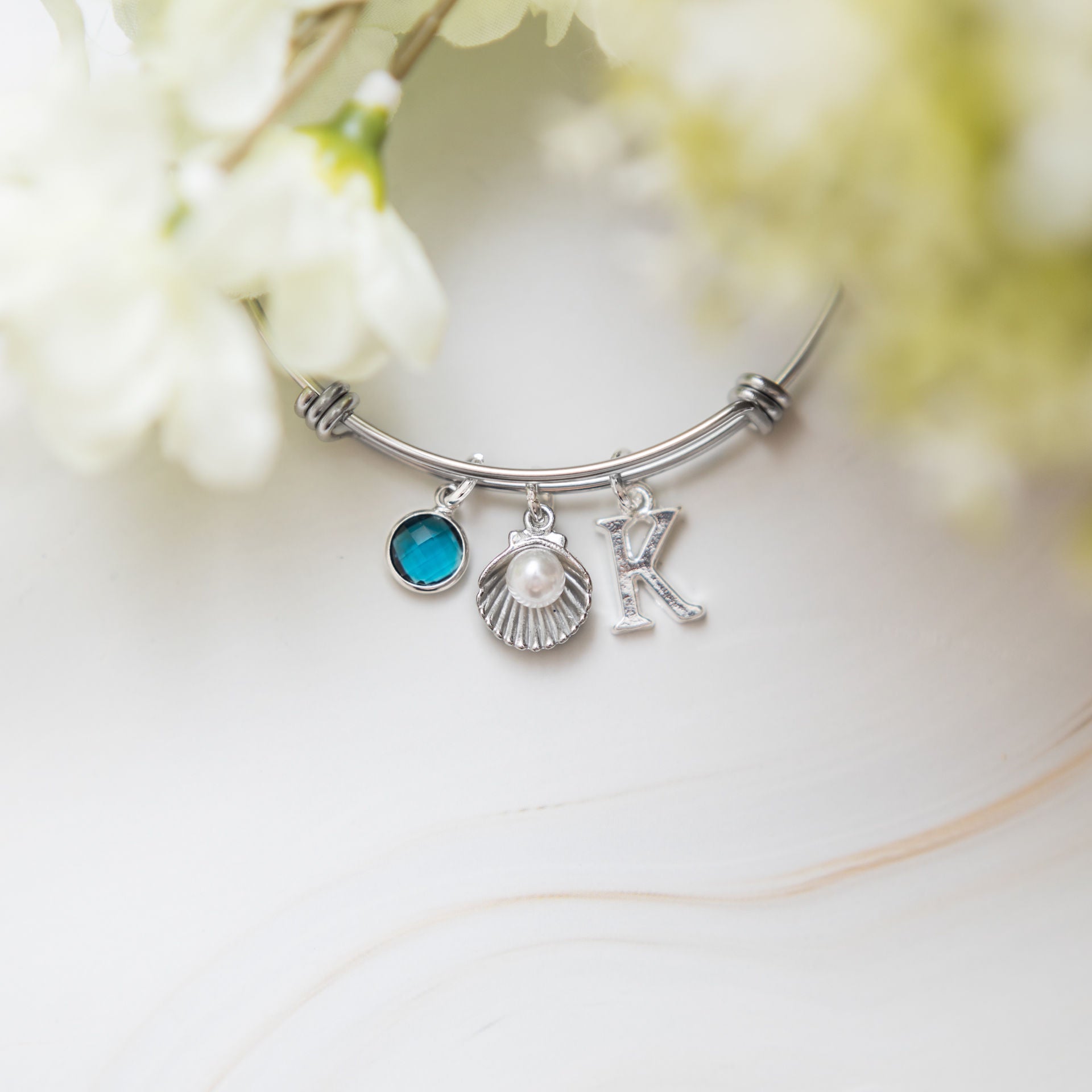 Shell bracelet, adjustable bangle, personalised gifts, birthstone and letter charms, beach ocean jewellery